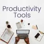 A man with laptop around productivity tools